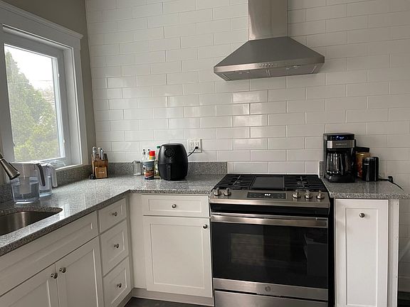 Kitchen - all new applicances, subway tile wall, granite counters, cabinets, windows, etc.