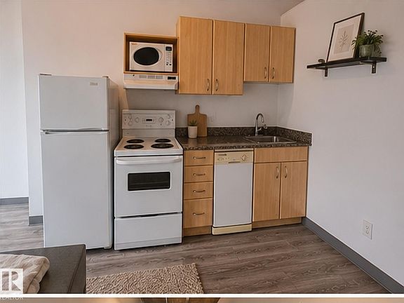 4th image of 10024 Jasper Ave NW #807