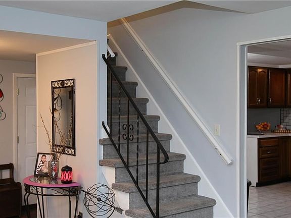 New carpet up stairs and through bedrooms.