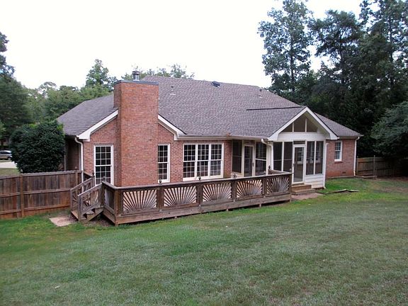 Large fenced backyard.