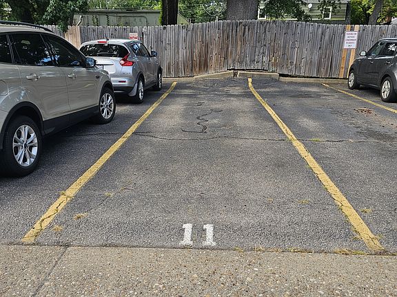 Assigned parking space #11 for 2 cars is clearly visible right from your living room window. Enjoy the peace of mind that comes with keeping an eye on your vehicle at any time.