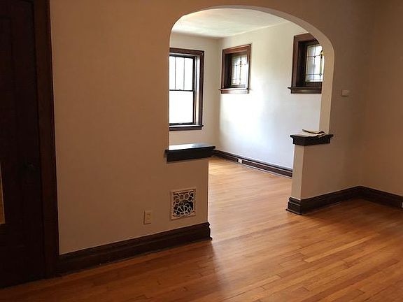 Large living room and dining room (stained glass windows)