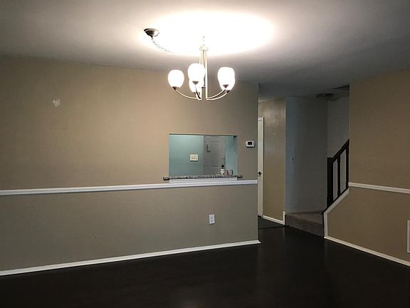 dining room area and view of stairs to go upstairs