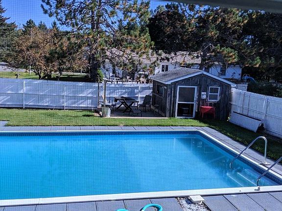 20x50 pool with deck and bar