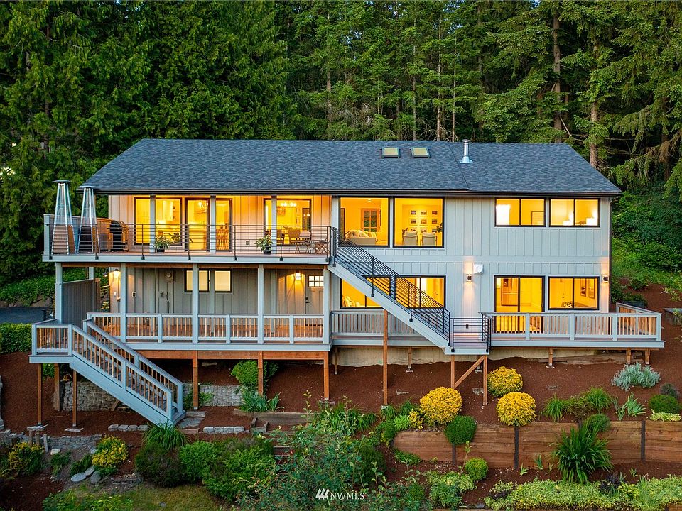 New 40 year roof & skylights, Anderson fiberglass windows & sliders, New upper & lower Trex decking with upper black railing, Hardie siding. Both upper and lower deck can support a hot tub. >
