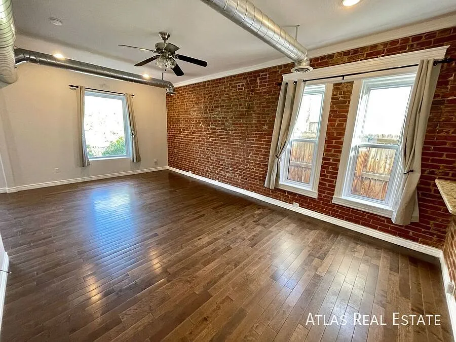 Coming Soon Historic Baker Charmer With Exposed Brick, Private Yard & 2-Car Garage — Photo 1