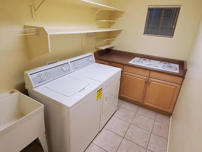 laundry room, utility sink, and extra cook top
