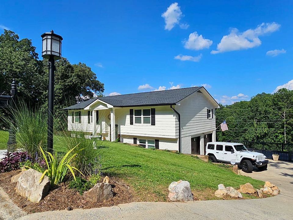 Front view of home, driveway and two car garage