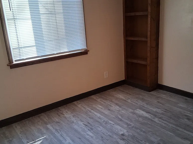 Smallest bed room with built in book cases.