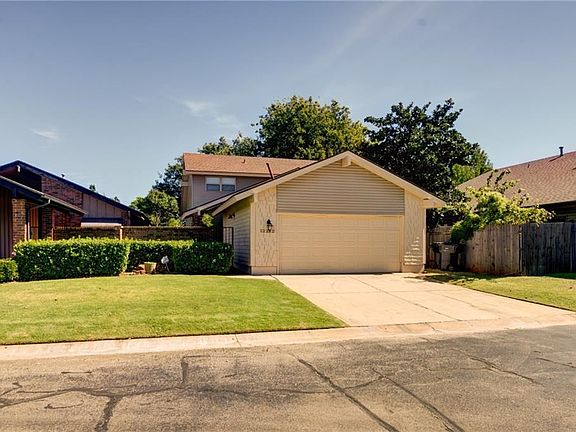 Master bedroom downstairs, two bedrooms upstairs.  There are nice additional parking places for guests, if you ever want to have a party! This neighborhood has such nice amenities!