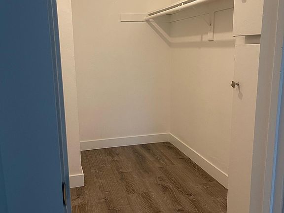 Walk in closet in master bedroom.