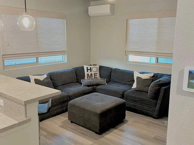 Family room with ceiling fan.