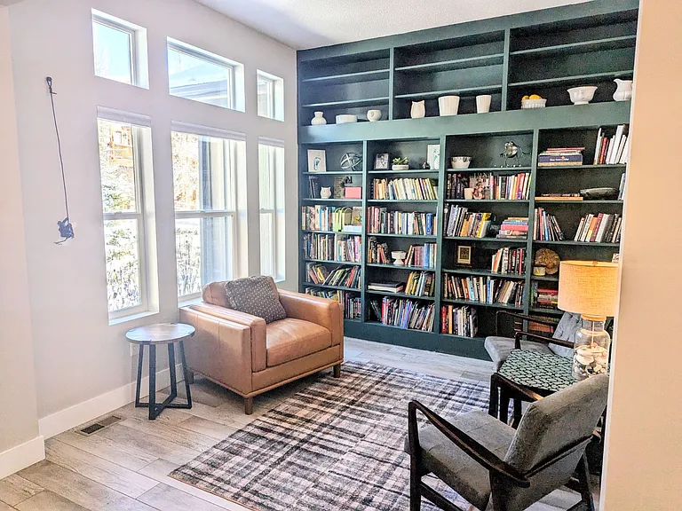 Just off the entryway is your own library space or office.