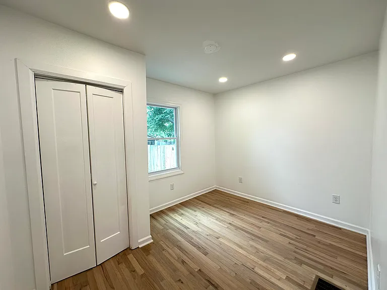 Second guest bedroom with closet