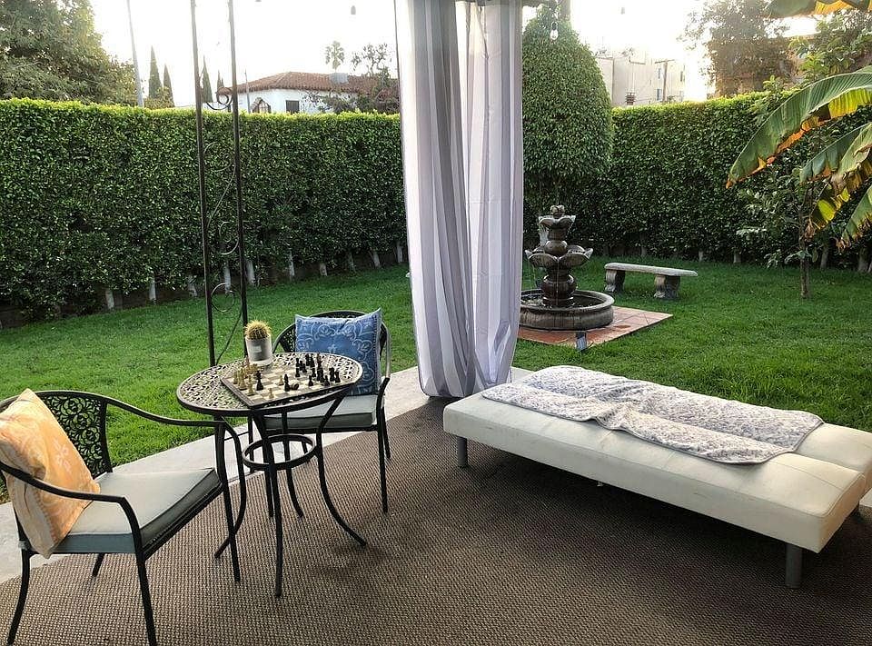 View of side yard from patio before we put up the sun shade.