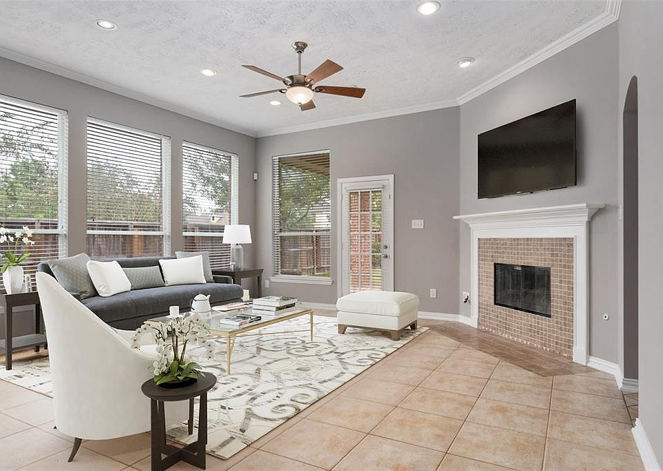 Very Spacious Family Room with Updated Gas Fireplace, Lots of Huge Windows and more Chunky Crown Molding,