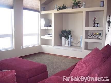 Top floor living area
						:
						Built in entertainment center wired for surround sound