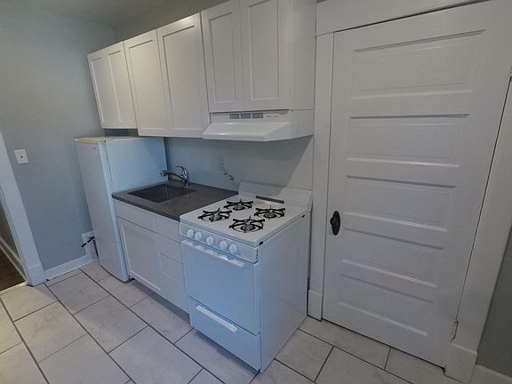 Kitchen view of laundry door