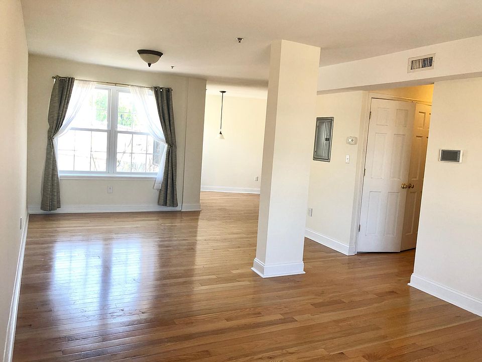 Living & Dining Area, entry at right - laundry, coat closet, front door