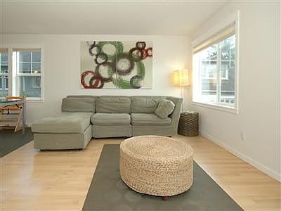 Spacious living room with beautiful hrdwood flrs and views of Sound & Mtns.