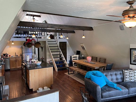 Open A frame kitchen, dining, and loft