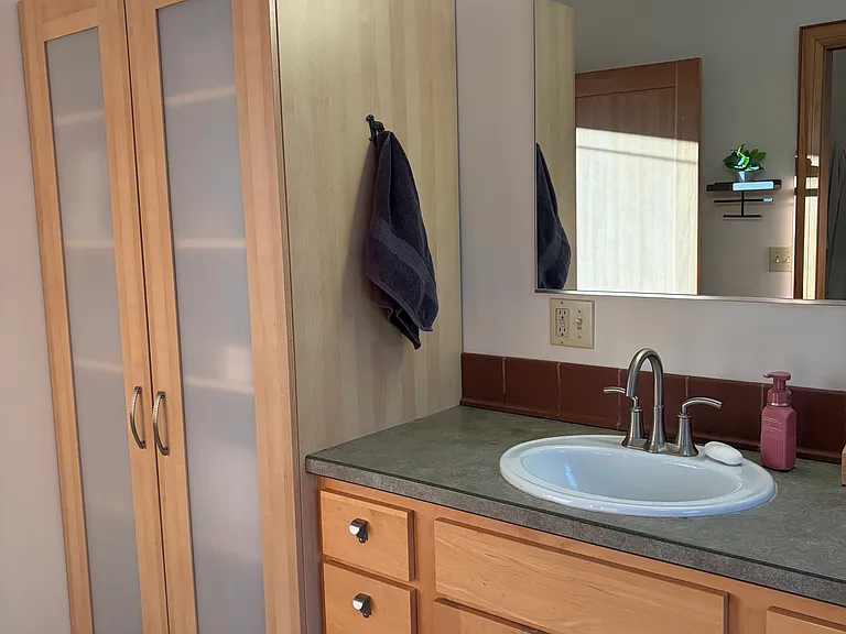 Half of upper floor jack-and-jill bathroom.