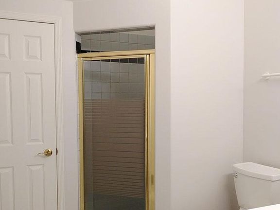Shower bathroom with extra storage