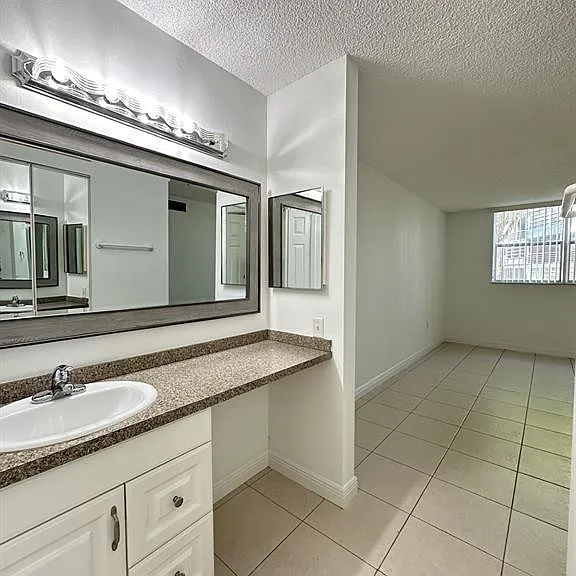 9401 Lime Bay Blvd #115 — Photo 14