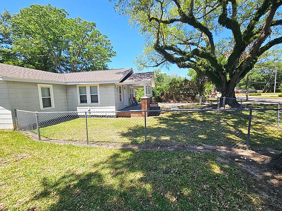Side of Home - Fenced Yard
