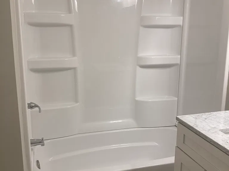 Brand new tub/shower.