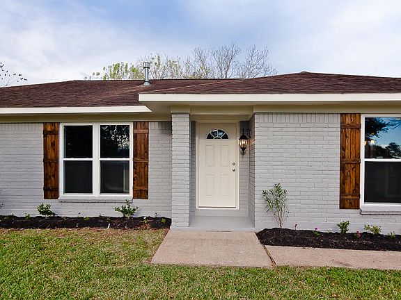 A new front door and exterior lighting were just installed.