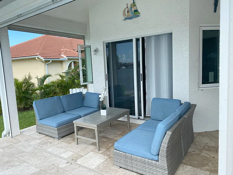 lounge on covered terrace to share a nice aperitif
