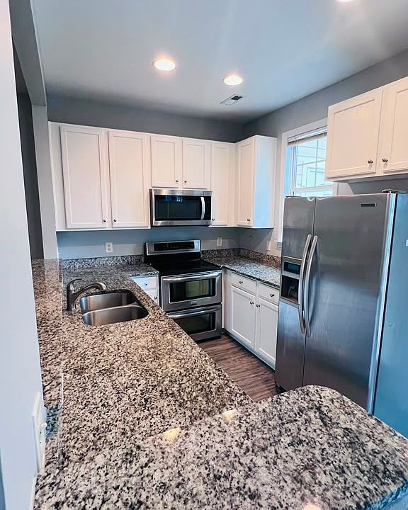 Kitchen with SS appliances