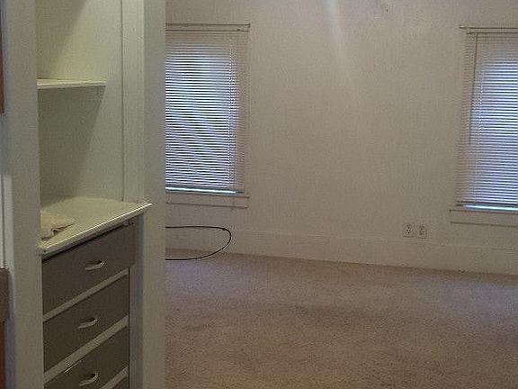 Kitchen looking into living room