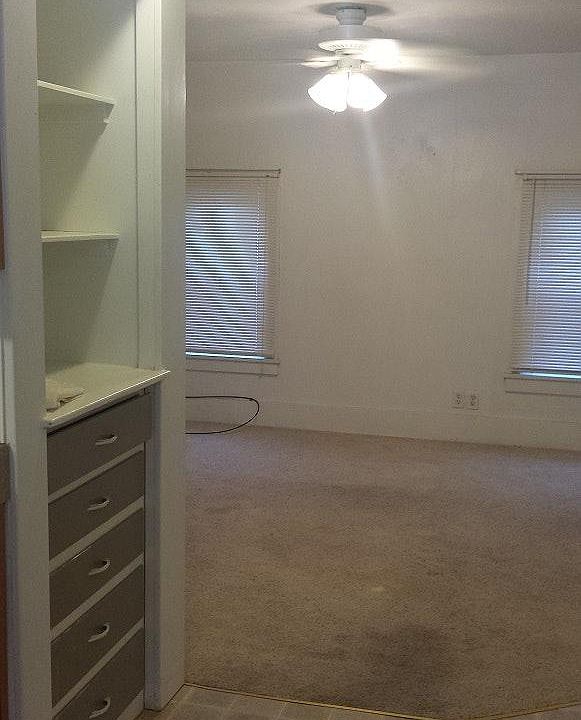 Kitchen looking into living room