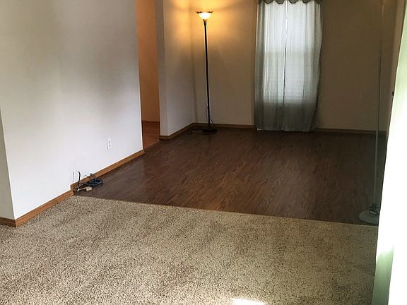 New flooring, fresh paint includes window treatments