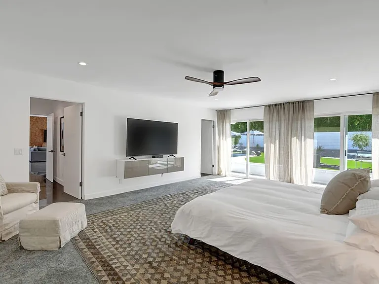 Primary huge bedroom . king bed, ensuite bathroom with shower/ dual sinks and gigantic walk in closet .