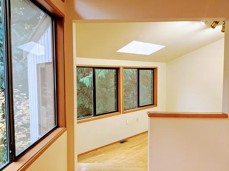 The office enjoys plenty of natural light and a soothing view of Douglas firs.