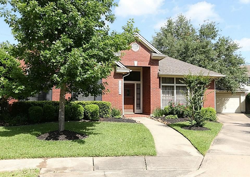 Beautiful one story Village Builder home with mature landscaping has great curb appeal in the master