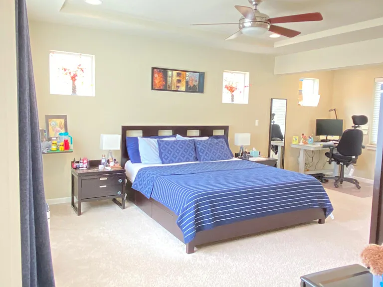 Master bedroom - spacious with a retreat area, that can easily fit a King-sized bed with two night stand, two desks just on one side of the wall!