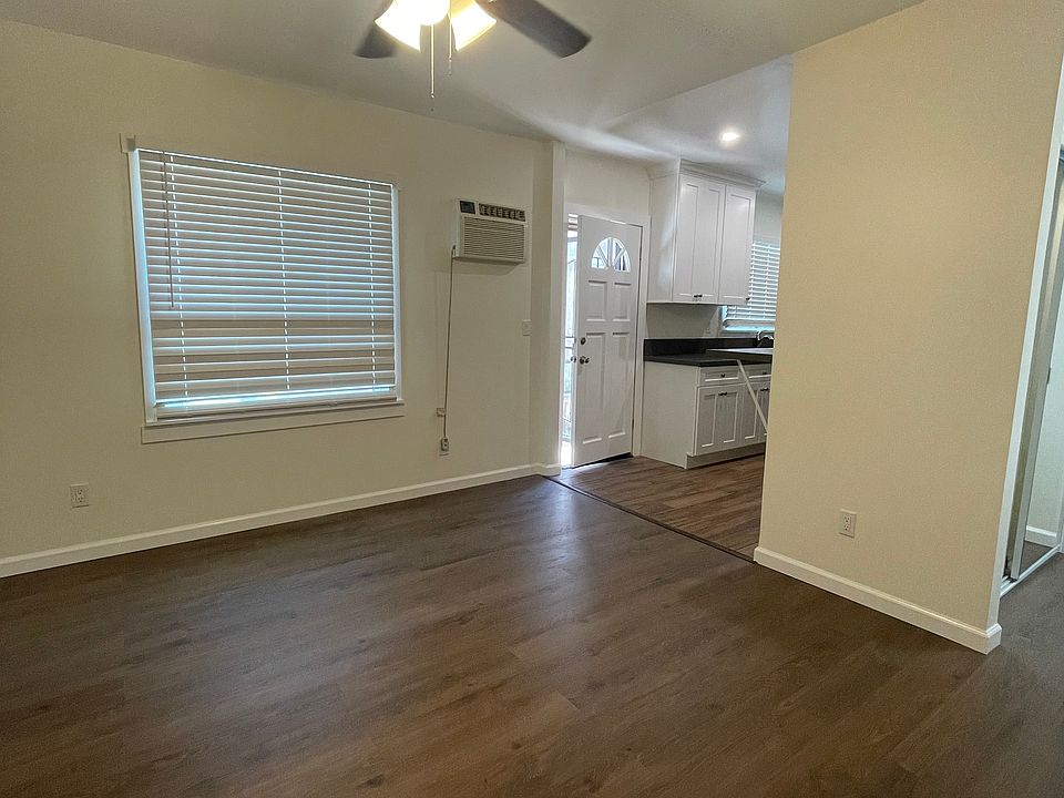 Interior entrance view to front door and living room