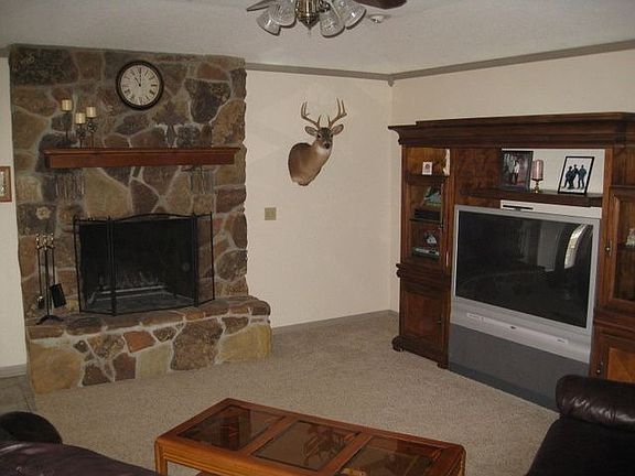 Large family room with wood burning fireplace