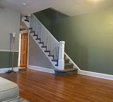 Foyer Stairway and Egress to the Kitchen