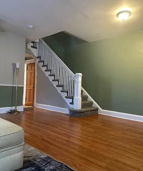 Foyer Stairway and Egress to the Kitchen