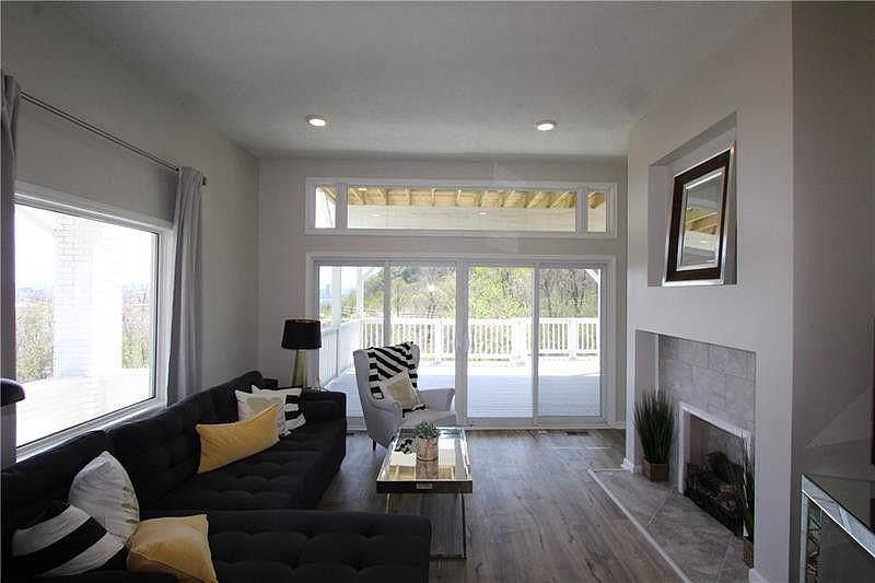 family room with gas fireplace and amazing view of the city