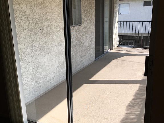 View of Balcony from Master Bedroom, Direct access to balcony.