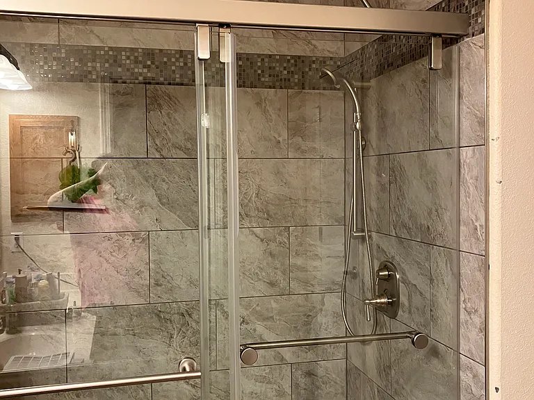 Updated shower in master bath with rain shower head