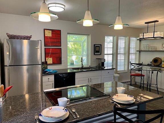 Large, light, bright, kitchen and dining area.