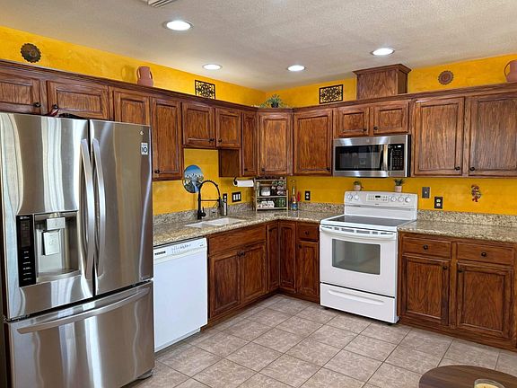 5th image of 14551 E 49th St