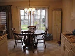 Nice dining area open to kitch and to lr; sliding doors to rear patio